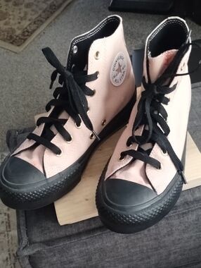 Converse Pink High-Top Sneakers with Black Soles and Laces